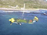 A2A_030 - a YAK 52 near Slangkop lighthouse near Kommertjie
