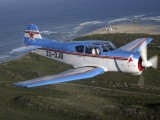 A2A_065 - Patrick Davidson in a YAK 18T over Cape Recife, near Port Elizabeth, Eastern Cape. With him is Frans Dely