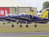 RIAT2009_223 - two of the Breitling team taking off in formation