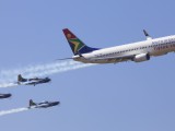 Swartkop_008 - the Silver Falcons in formation with an SAA Boeing 737